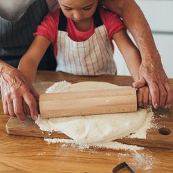 Grandmother and granddaughter cooking together